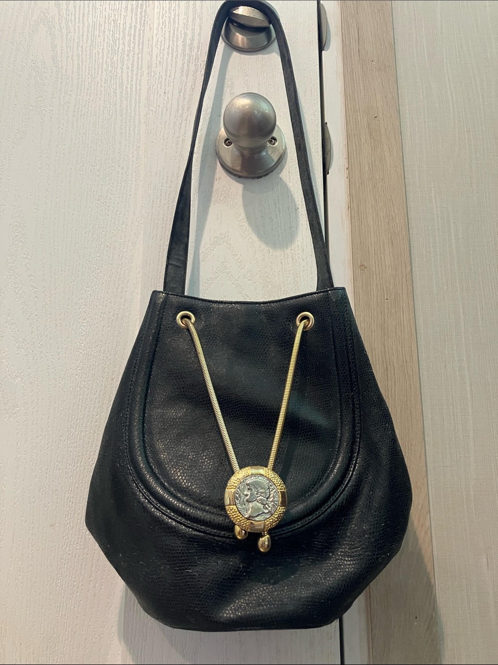 Rodo vintage Black Leather bucket Bag with Gold Medallion Accent